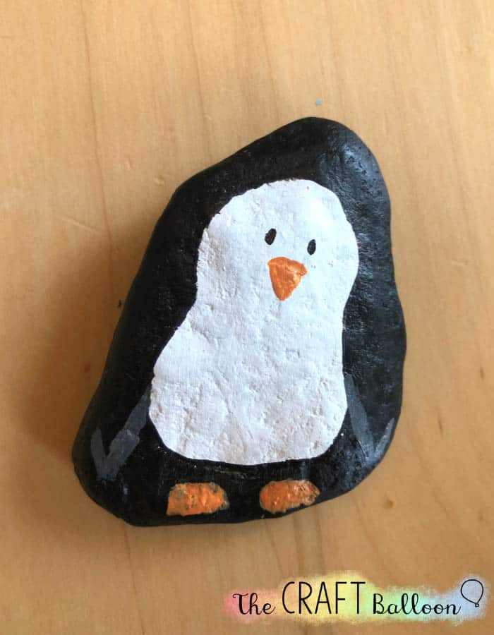 Complete penguin painted rock