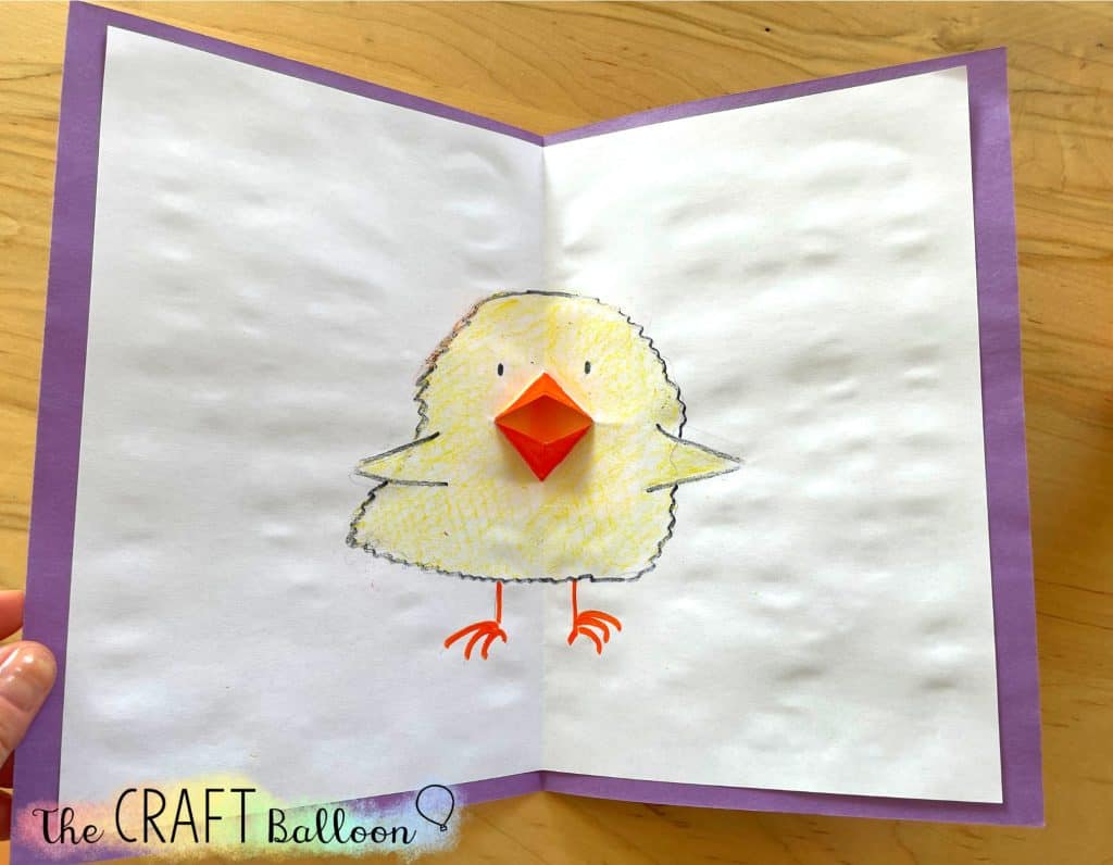 Easter chick with purple backing paper