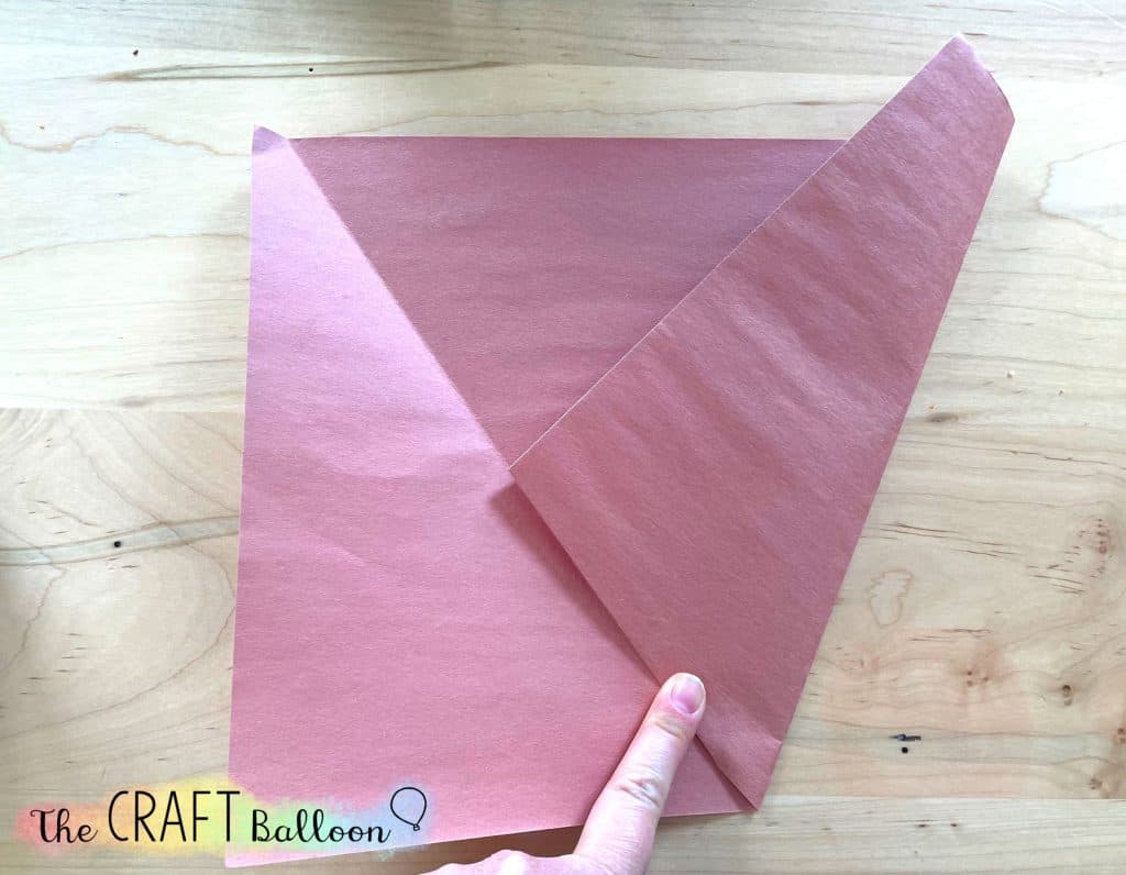 sheet of brown sugar paper with one fold made