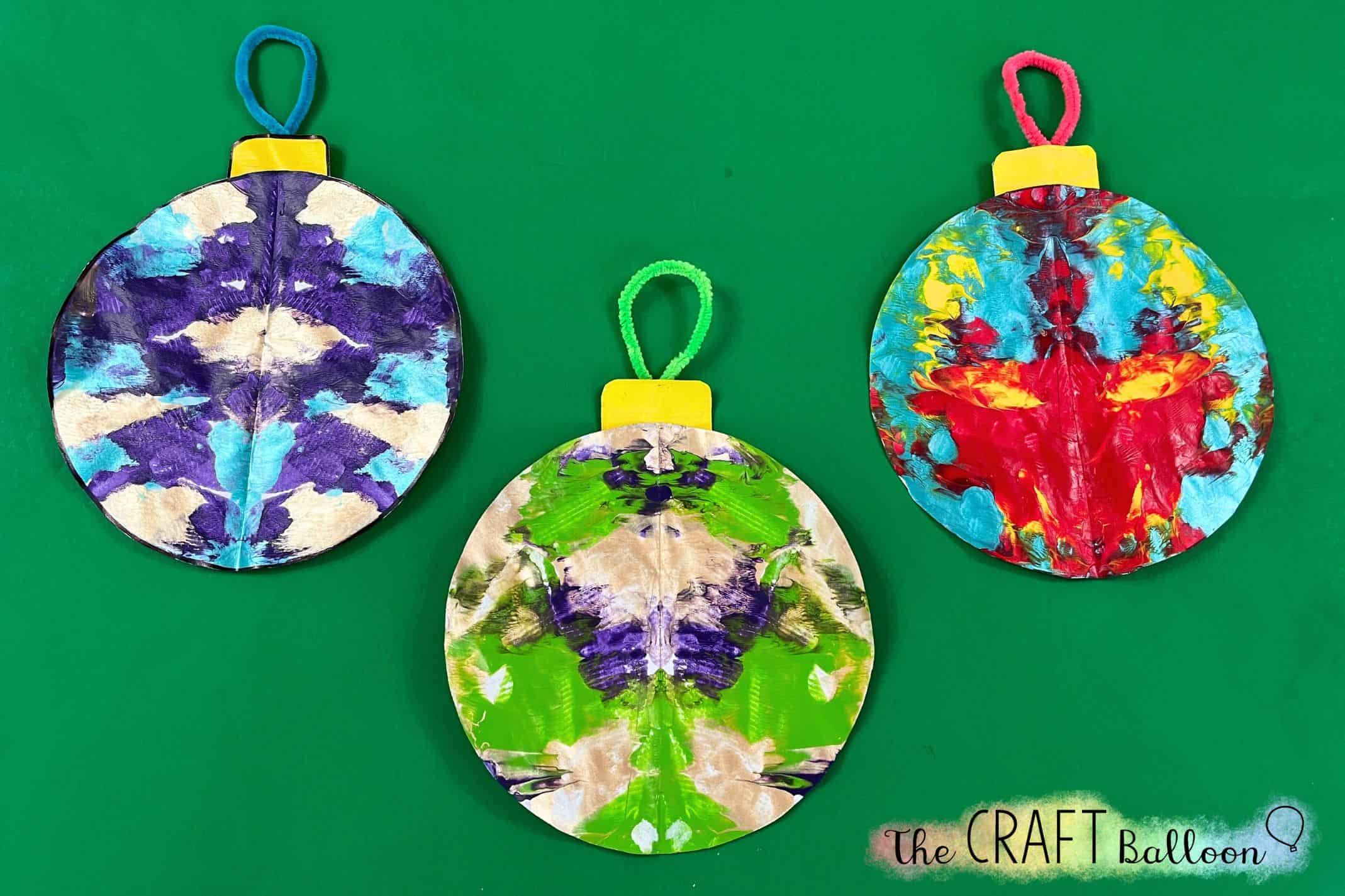 THREE SYMMETRY PAINTED CHRISTMAS BAUBLES